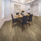 A dining room featuring COREtec Advanced Luxury Vinyl Scratch Resistant Plank Flooring by US Floors